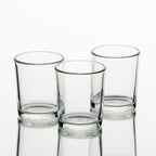 Set of 144 Richland Votive Candles White Unscented and 144 Clear Glass Eastland Votive Holders