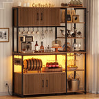 Itaar Bakers Rack with Power Outlet and LED Light, 45.3 Inch Farmhouse Coffee Bar Cabinet, Kitchen Microwave Stand with Storage, Glass Cabinet, Goblet Holder and 8 Hooks, Black